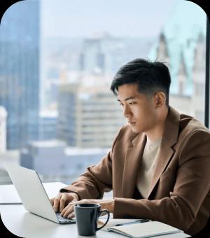 Person using laptop on table